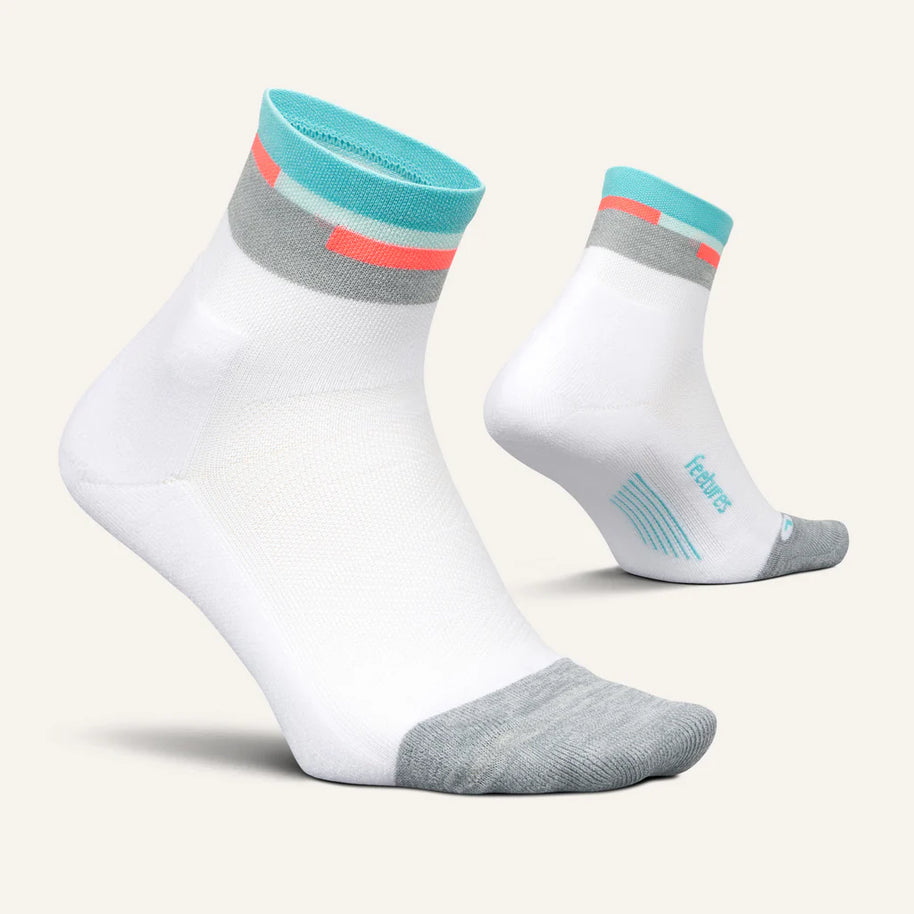 Elite Light Cushion Quarter by Feetures in white, grey, and teal with anatomical design and targeted compression for running and extended wear