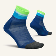 Elite Light Cushion Quarter by Feetures in blue and green with anatomical design and targeted comp for running and active use