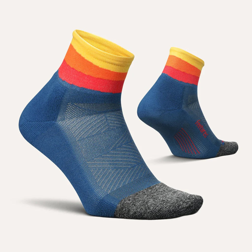 Elite Ultra Light Cushion Quarter by Feetures in blue, yellow, and red with targeted compression and ultra light cushioning for running comfort