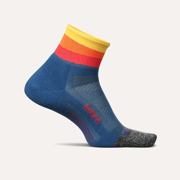 Elite Ultra Light Cushion Quarter by Feetures in blue with orange and yellow stripes, ultra light cushioning and targeted compression for running