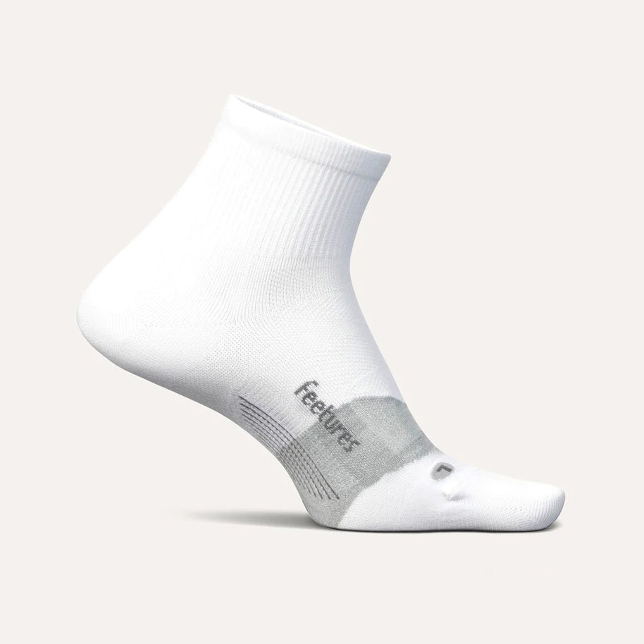 Elite Ultra Light Cushion Quarter by Feetures in white with targeted compression and ultra light cushioning for running comfort and support