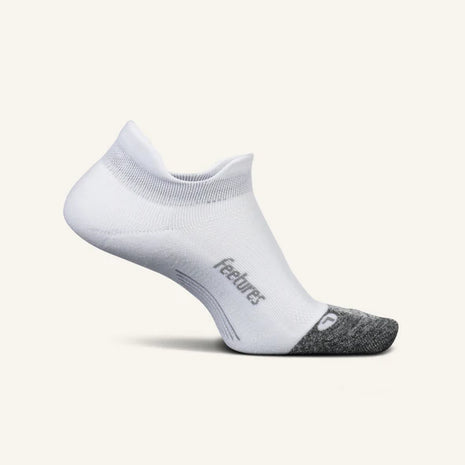 Elite Light Cushion No Show Tab by Feetures in white and grey with anatomical design and targeted compression for running and active use