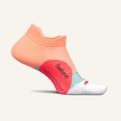 Elite Light Cushion No Show Tab by Feetures in coral and white with anatomical design and targeted compression for running and active use
