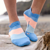 Elite Ultra Light Cushion No Show Tab by Feetures in blue and peach with anatomical fit, targeted compression, and ultra light cushioning for running