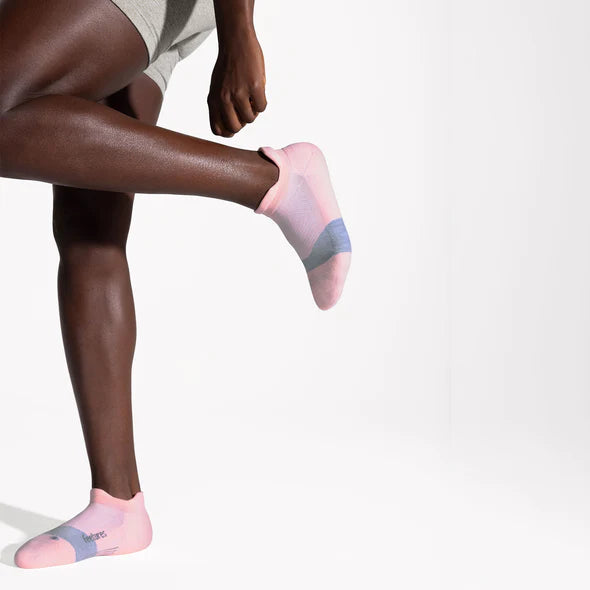 Elite Ultra Light Cushion No Show Tab - 2023 by Feetures in pink and gray, lightweight cushioned socks for running and high activity use
