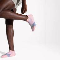 Elite Ultra Light Cushion No Show Tab - 2023 by Feetures in pink and gray, lightweight cushioned socks for running and high activity use