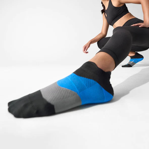 Elite Ultra Light Cushion No Show Tab by Feetures in black, blue, and gray with targeted compression and ultra light cushioning for running comfort