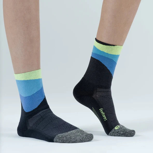 Elite Ultra Light Cushion Mini Crew by Feetures in black blue and green with targeted compression and ultra light cushioning for running