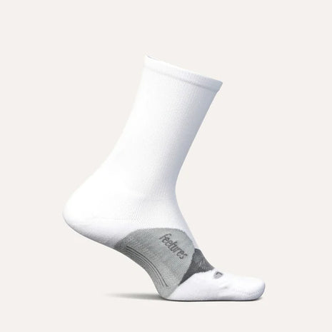 Elite Light Cushion Mini-Crew by Feetures in white and grey with anatomical design, targeted compression, and light cushioning for running comfort