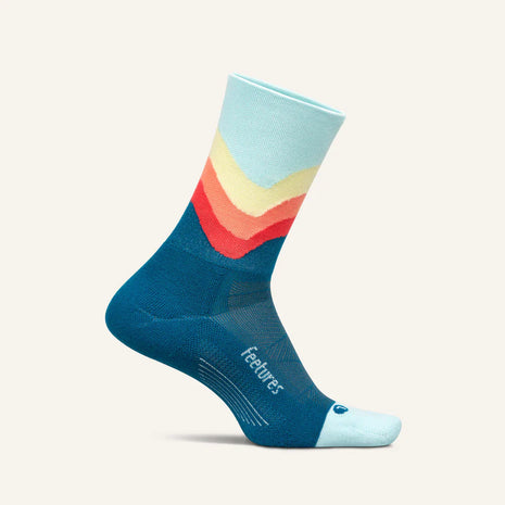 Elite Light Cushion Mini-Crew by Feetures in blue, yellow, and red with anatomical design, targeted compression, and light cushioning for running comfort