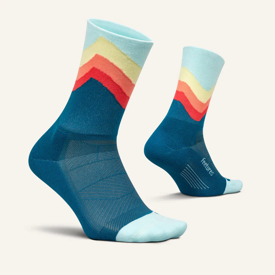 Elite Light Cushion Mini-Crew by Feetures in blue and pastel with anatomical design, targeted compression, and light cushioning for running comfort