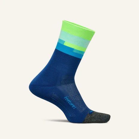 Elite Light Cushion Mini-Crew by Feetures in blue, green, and grey with anatomical fit, targeted compression, and light cushioning for running.