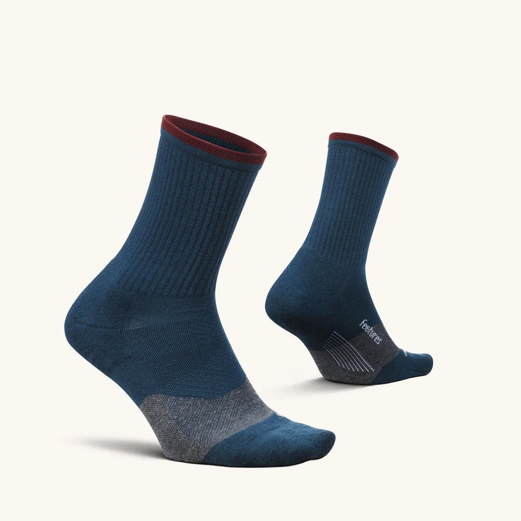 Trail Max Cushion Mini-Crew by Feetures in blue with maroon cuff, anatomical design and targeted compression for hiking and trail running