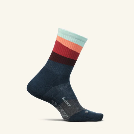 Trail Max Cushion Mini-Crew by Feetures in navy, burgundy, coral, and mint with anatomical design and Targeted Compression for hiking and trail running