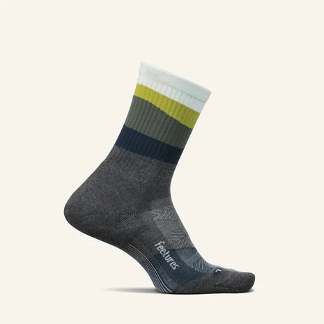 Trail Max Cushion Mini-Crew by Feetures in grey, navy, olive, and white with targeted compression for hiking and trail running comfort