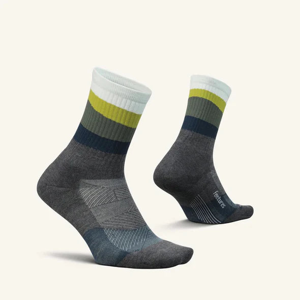 Trail Max Cushion Mini-Crew by Feetures in grey, navy, olive, and white with anatomical design and targeted compression for trail running and hiking