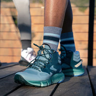 Trail Max Cushion Mini-Crew by Feetures in grey and blue with anatomical design and targeted compression for hiking and trail running