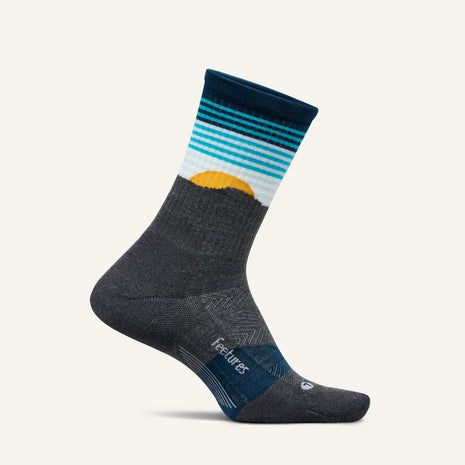 Trail Max Cushion Mini-Crew by Feetures in dark grey with blue and yellow, anatomical design with Targeted Compression for hiking and trail running