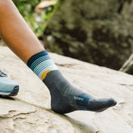 Trail Max Cushion Mini-Crew by Feetures in blue, yellow, and gray with anatomical design and targeted compression for hiking and trail running