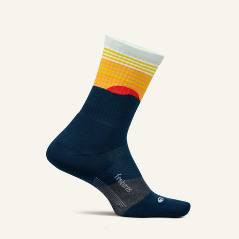 Trail Max Cushion Mini-Crew by Feetures in navy, yellow, and red with anatomical design and targeted compression for hiking and trail running
