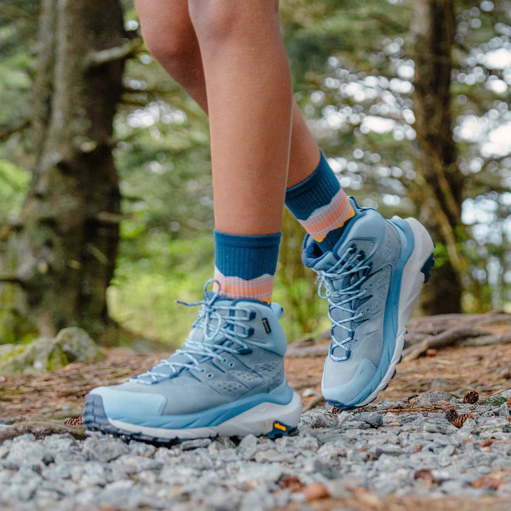 Trail Max Cushion Mini-Crew by Feetures in blue with pink and cream accents, anatomical design, targeted compression for hiking and trail running