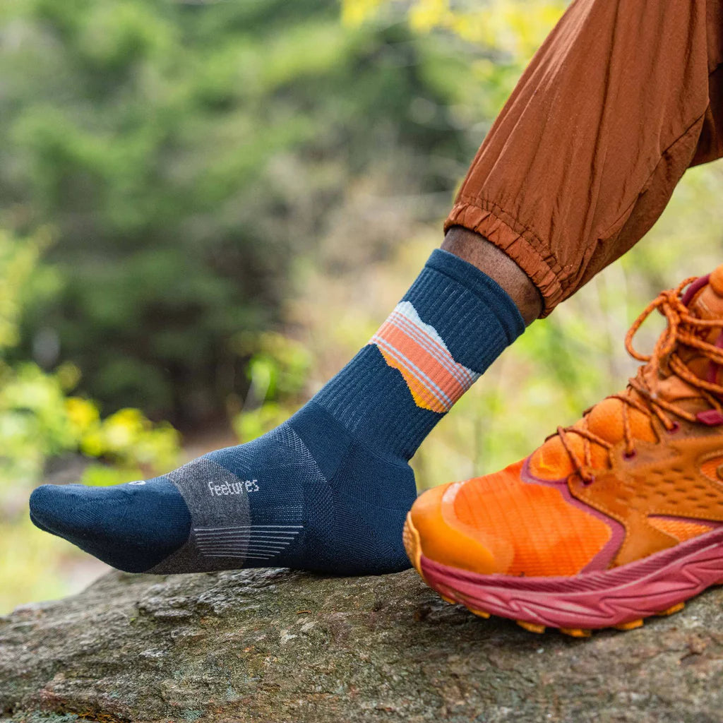 Trail Max Cushion Mini-Crew by Feetures in navy with orange and white, cushioned socks with anatomical design for trail running and hiking