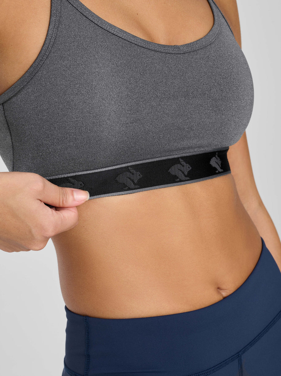 Strappy Pocket Bra - Women by Rabbit in dark grey with black band, built-in pocket, minimal bounce, comfortable for active wear