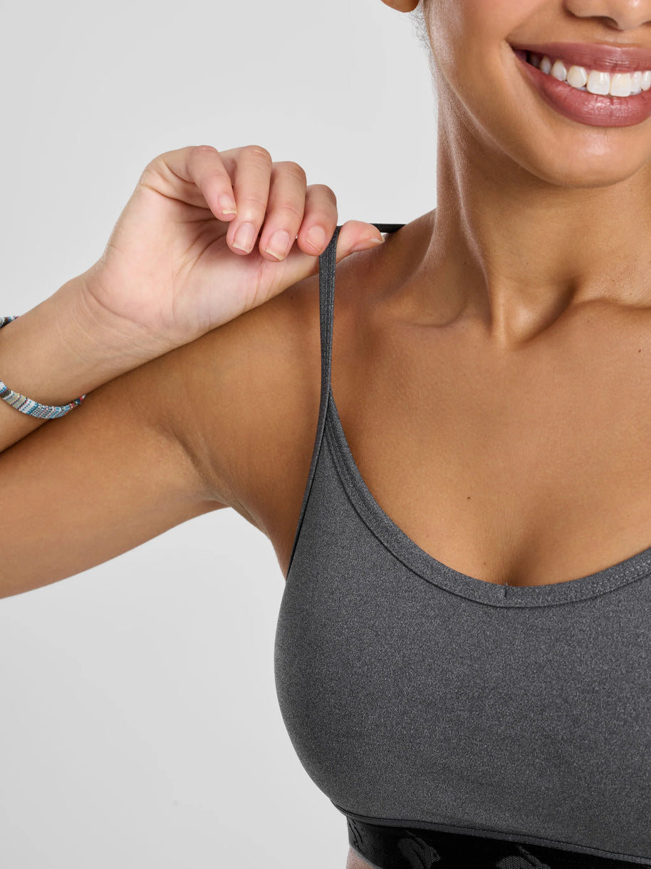 Strappy Pocket Bra - Women by Rabbit in dark grey with built-in pocket, minimal bounce, and total comfort for running and active use