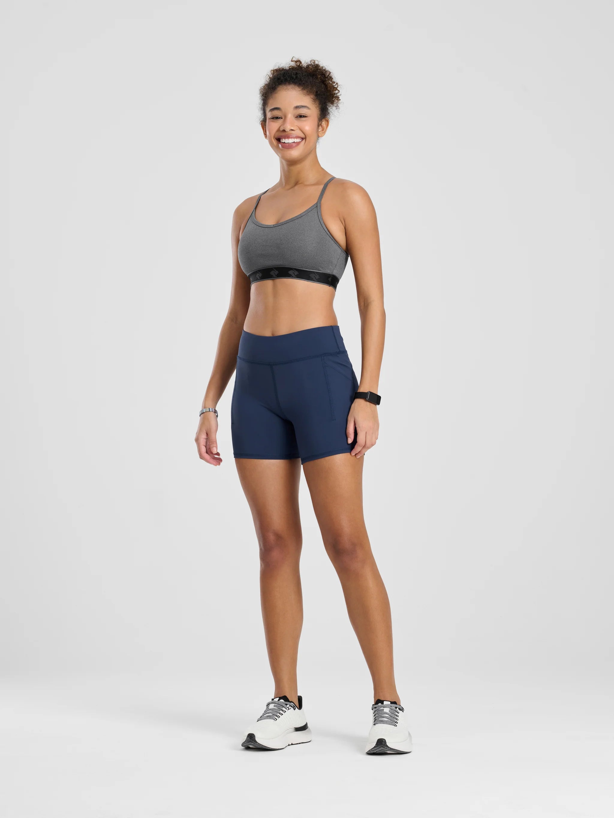 Strappy Pocket Bra - Women by Rabbit in grey with built-in pocket, minimal bounce, and total comfort ideal for activewear and running.