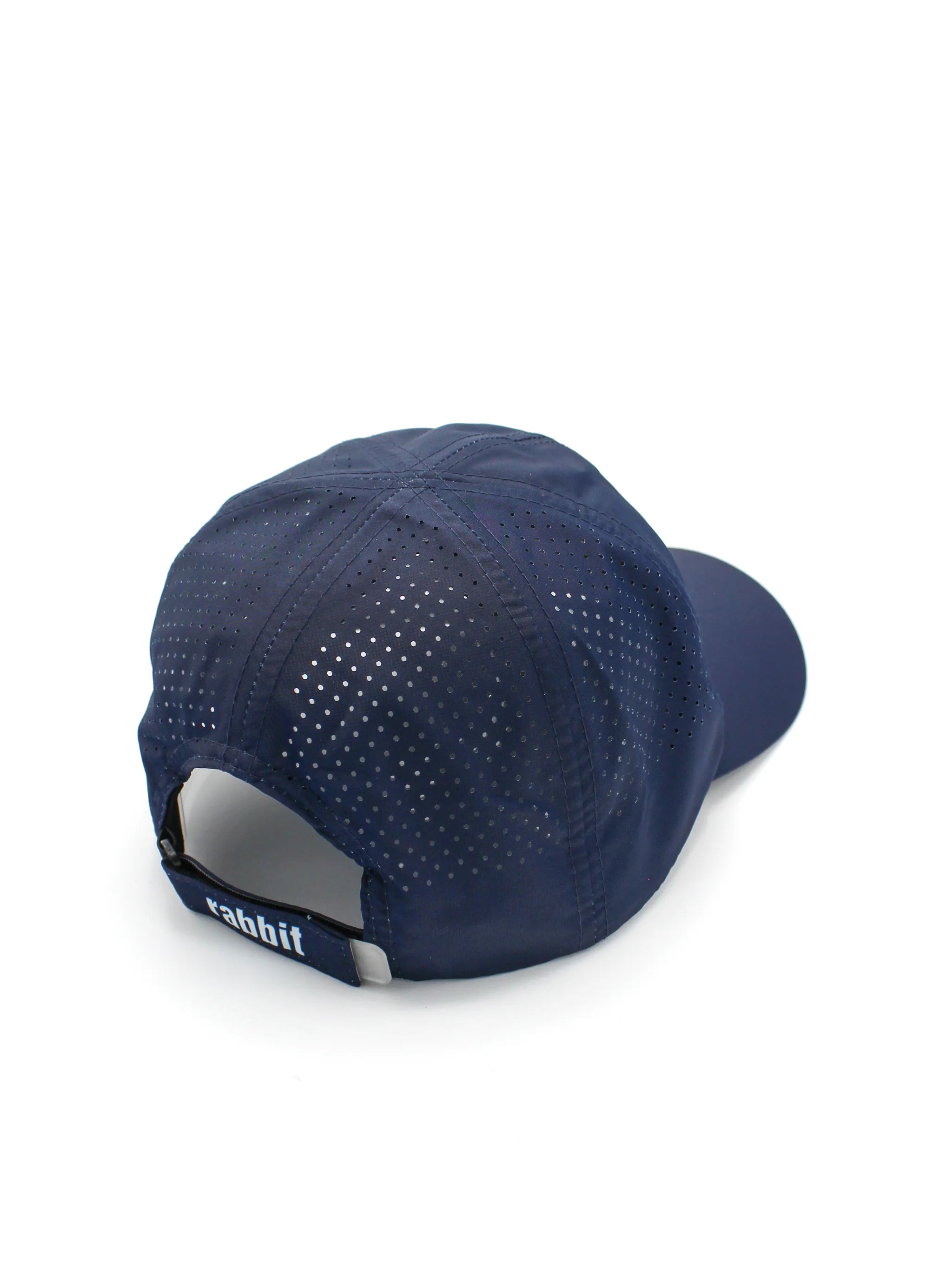 Elite Hat by Rabbit in navy blue with laser-cut vents, lightweight woven fabric, baseball cap style for sun and gear protection