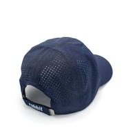 Elite Hat by Rabbit in navy blue with laser-cut vents, lightweight woven fabric, baseball cap style for sun and gear protection