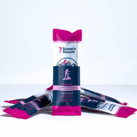 Everest Dark Chocolate Endurance Bar (30g) by 7 Summit Snacks in pink and black with 64% Peruvian dark chocolate, honey, and electrolytes for endurance