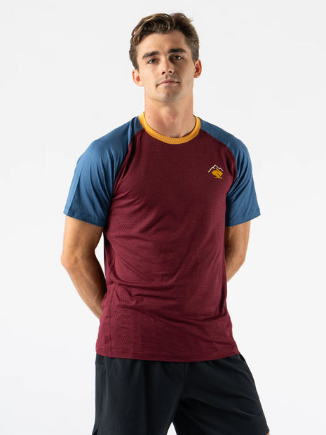 EZ Tee Perf SS Trail - Men by Rabbit in burgundy and blue with yellow trim, breathable perforated lightweight trail running shirt ideal for outdoor running