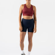 Utili Bra-Vo by Rabbit in red multifunctional sports bra with laser-cut pocket for essentials, minimizing bounce for running and training