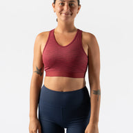 Utili Bra-Vo by Rabbit in deep red, multifunctional sports bra with bounce control and laser-cut pocket for running and active women