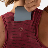 Utili Bra-Vo by Rabbit in dark red with laser-cut pocket for phone, multifunctional sports bra minimizing bounce for running and fitness