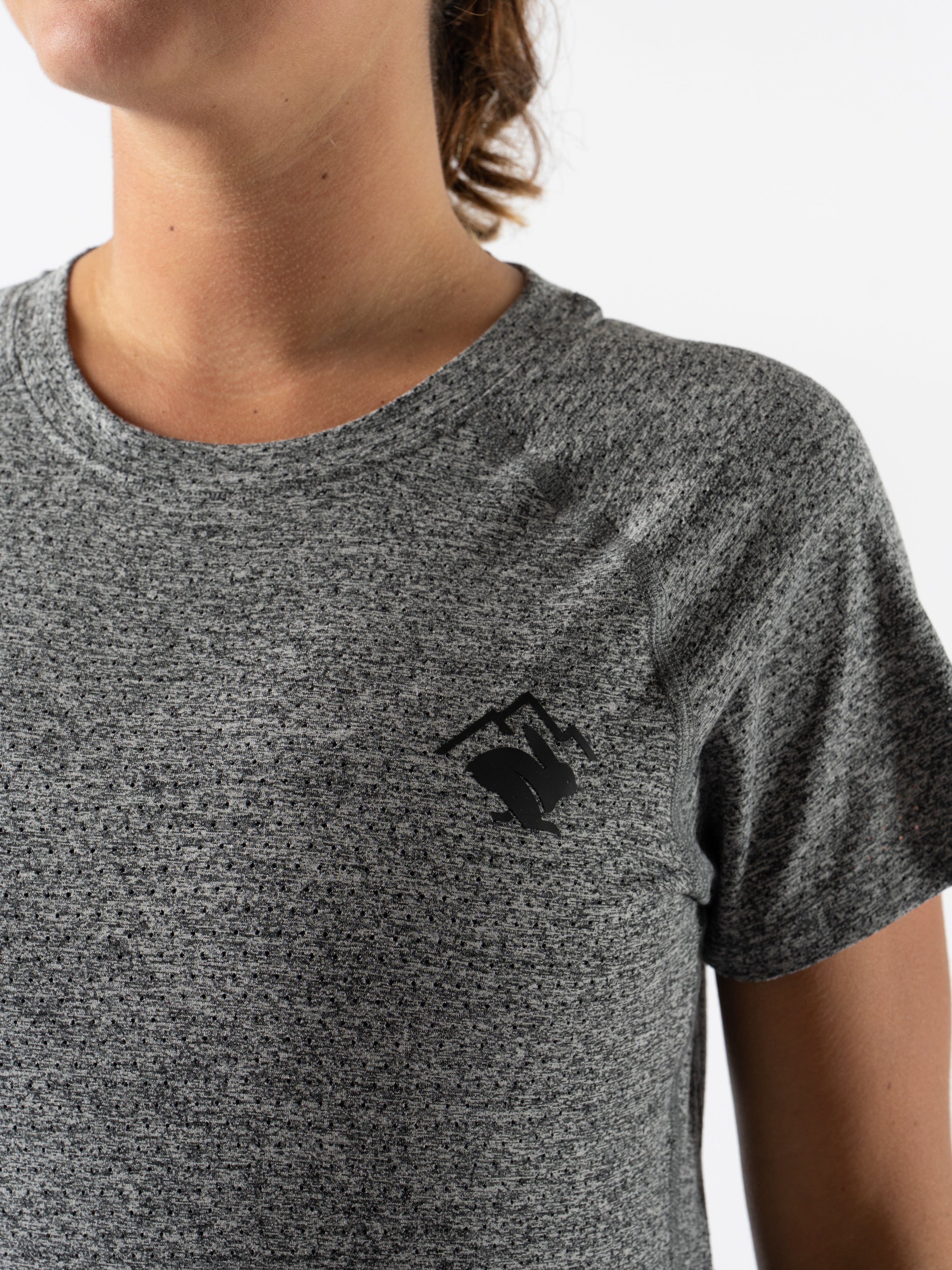 EZ Tee Perf SS Trail - Women by Rabbit in heather grey, breathable soft trail running top with perforations for lightweight comfort and moisture management
