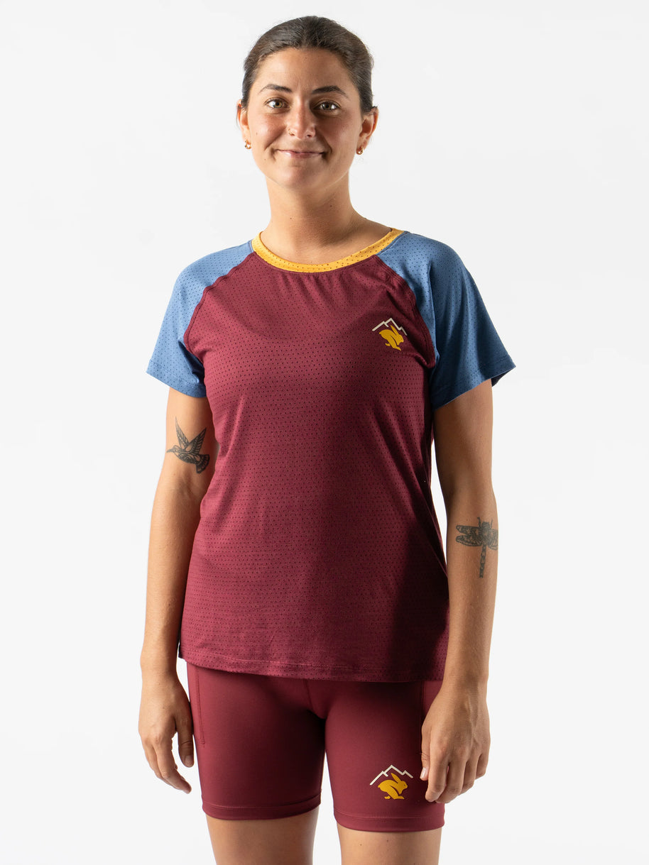 EZ Tee Perf SS Trail - Women by Rabbit in burgundy and blue lightweight breathable trail running top with perforations for enhanced ventilation