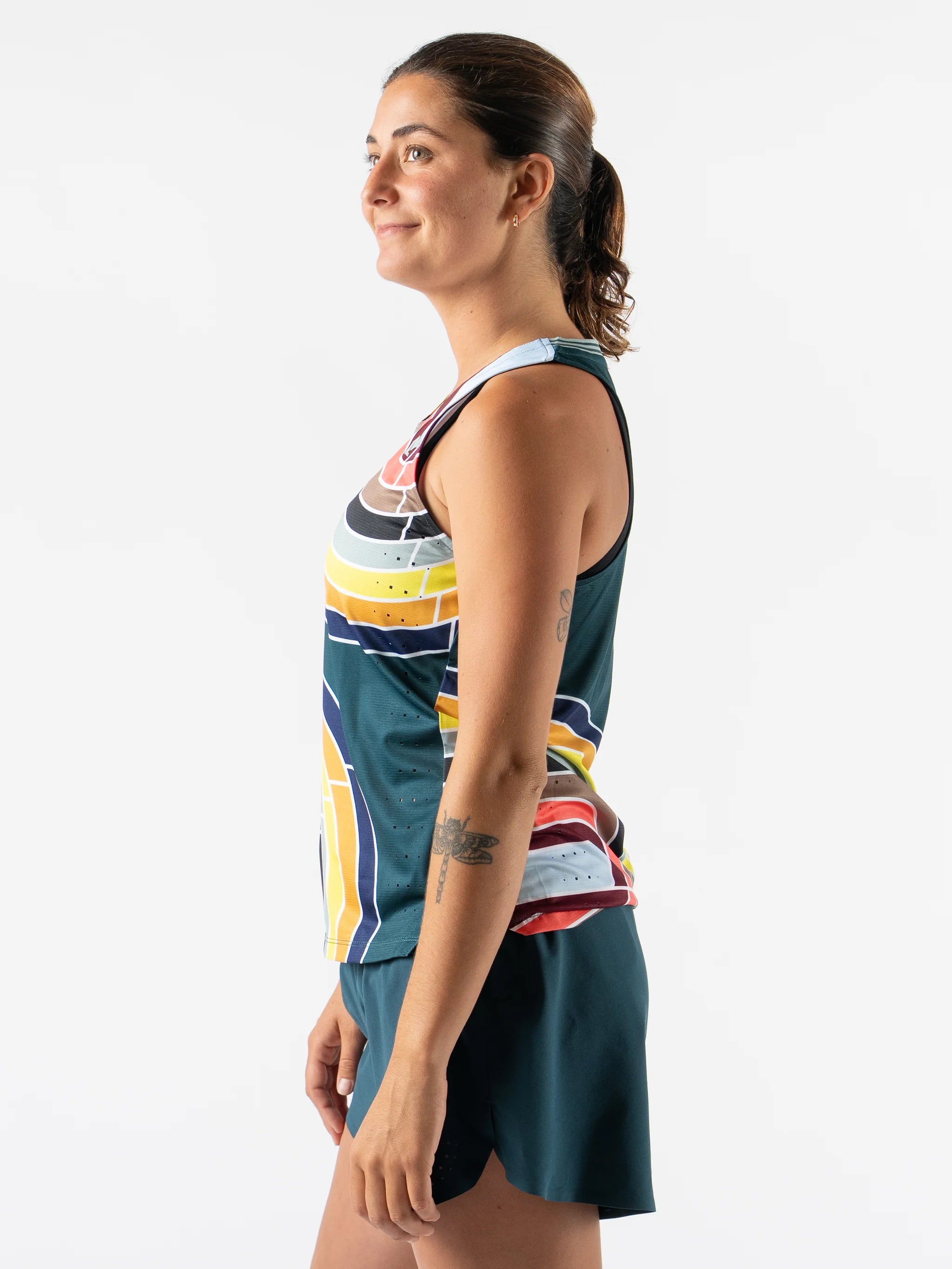 Race Pace Tank - Women by Rabbit in multicolor with breathable laser-cut perfs and microtextured inside for comfortable running and training.