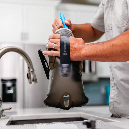 Reservoir/Water Storage Cleaning Kit by Hydrapak in black and blue with wire tube brush and long bristle brush for deep cleaning hydration reservoirs
