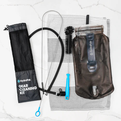 Reservoir/Water Storage Cleaning Kit by Hydrapak in black and blue with wire tube brush and long bristle brush for thorough cleaning