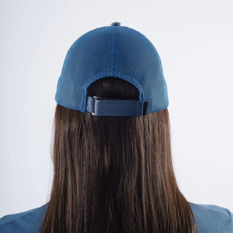 Basecamp Cap Unisex by Montane in blue with mesh back panels, rear hook and loop adjustment, and COOLMAX headband for outdoor use.