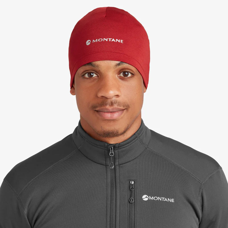 Dart XT Beanie by Montane in red, lightweight breathable cold weather headwear with moisture management for outdoor use