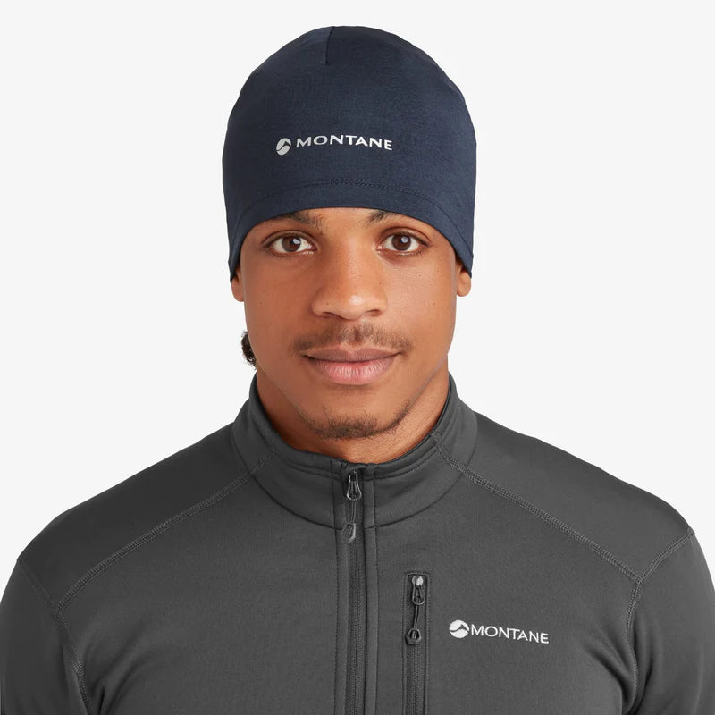 Dart XT Beanie by Montane in navy blue, lightweight breathable cold weather headwear with moisture management for outdoor use