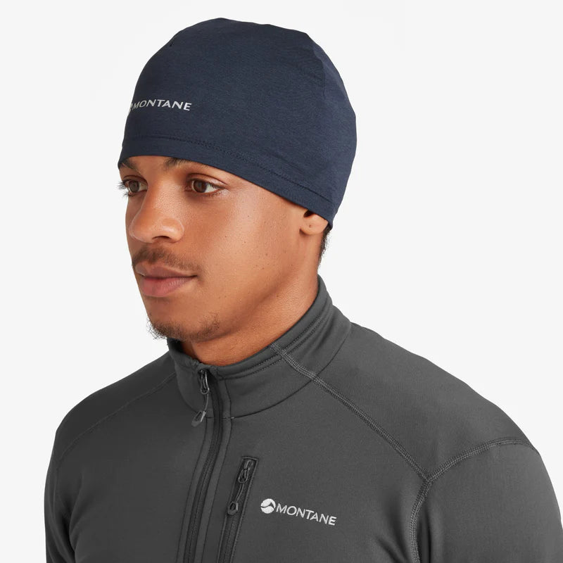 Dart XT Beanie by Montane in navy blue, lightweight breathable cold weather headwear with moisture management for running and outdoor use
