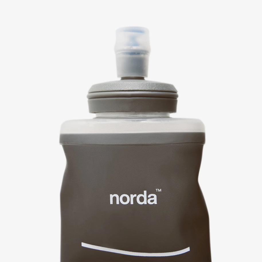 SoftFlask WMX by Norda in grey and transparent with tapered bottom, 500ml hydration flask designed for wide pack pockets in Canada running store