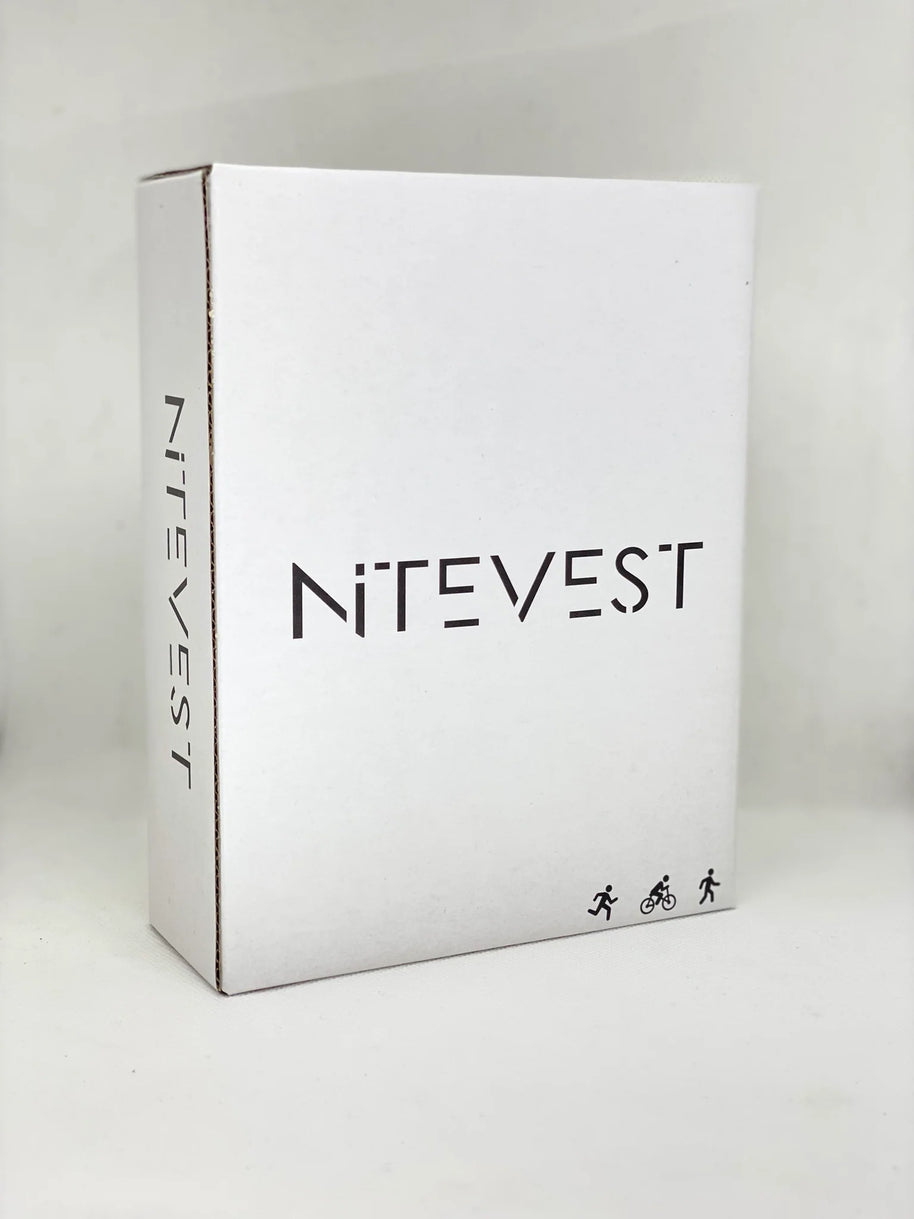 Rechargeble LED Safety Vest by NiteVest in white packaging for running and cycling safety with 360-degree illumination and chest light