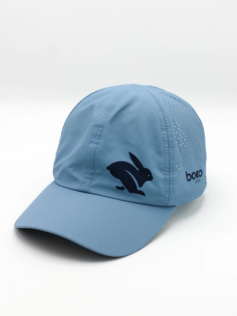 Elite Hat by BOCO in light blue with laser-cut vents, lightweight wicking fabric, bill for sun and gear protection ideal for running and outdoor use