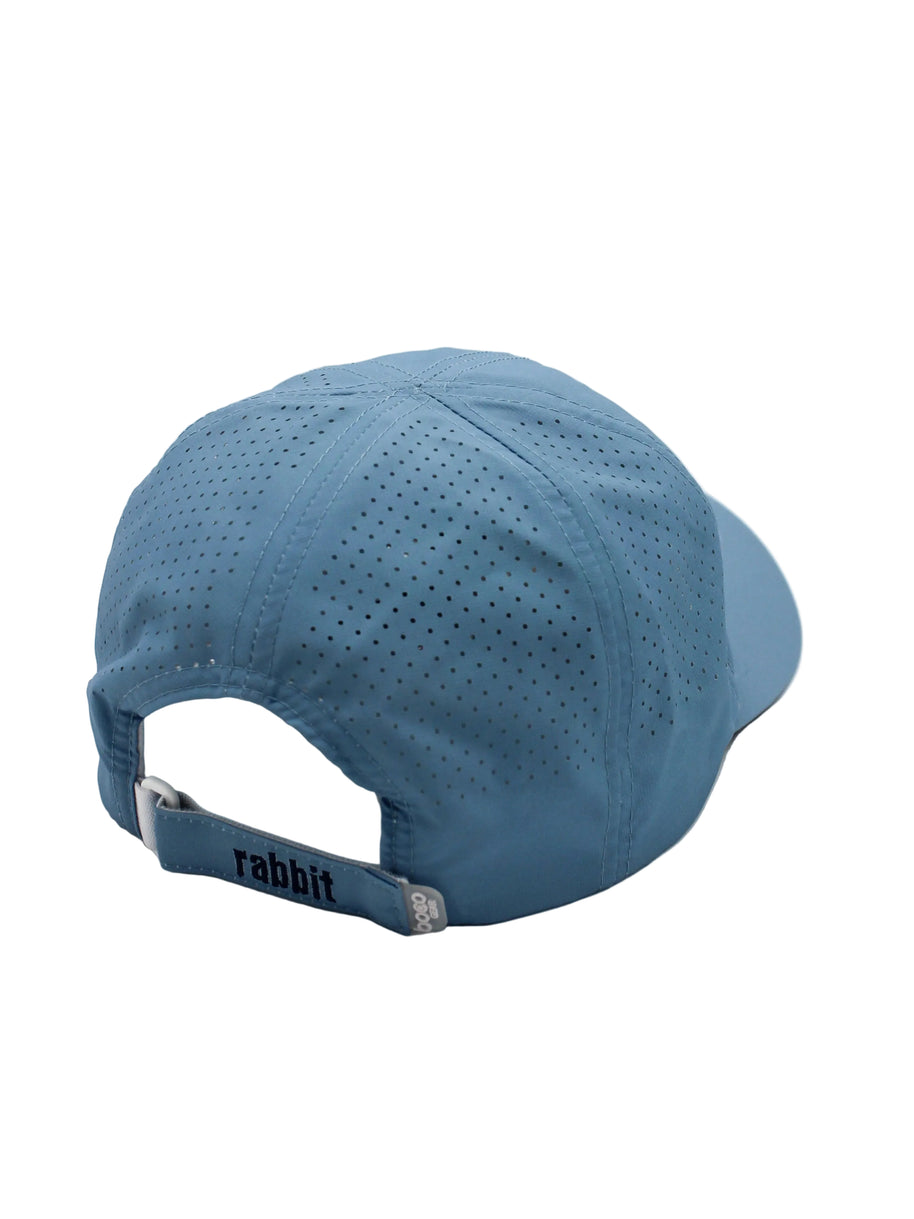 Elite Hat by Rabbit in blue with laser-cut vents for ventilation, lightweight-wicking cap with bill for sun and gear protection