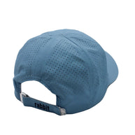 Elite Hat by Rabbit in blue with laser-cut vents for ventilation, lightweight-wicking cap with bill for sun and gear protection
